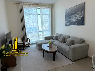 Luxury one-bedroom apartment in Ajman - Corniche - Etihad Tower - furnished with hotel-style furniture for monthly rent