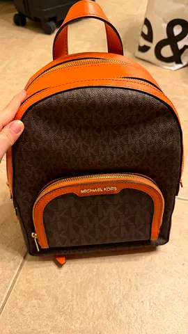 Michael Kors big brown monogram backpack - good condition