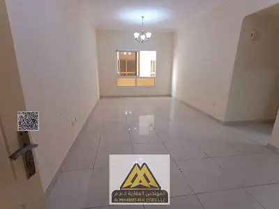 2BR in Al Nuaimiya 1, 2 baths, built-in wardrobes, central AC, free gym & pool, AED 36,002K/year, 4 payments.