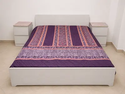 Modern White Bed Set with Matching Nightstands, cupboard and dresser with mirror.