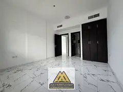 1BR in Al Rashidiya 2, second tenant, 2 baths, balcony, central AC, wardrobes, AED 30K/4 payments.