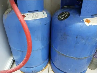Two blue LPG gas cylinders - used, working condition