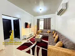 Luxury apartment, first occupancy, one bedroom and living room with a balcony and open view. Ajman,