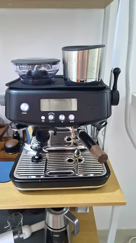 Semi-automatic espresso machine with steam wand and dual portafilters