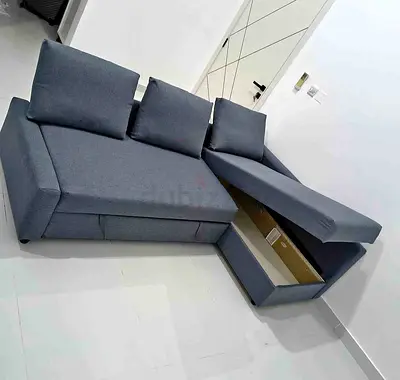 ikea L shape  sofa cum bed with big storage  and you can  fix the storage left or right any side