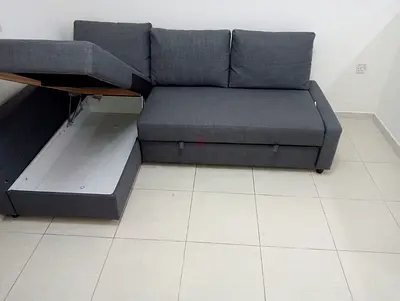 Grey L-Shaped Sofa Bed with Integrated Storage