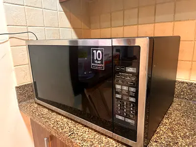 Samsung Stainless Steel Microwave - Good Condition, 10 Year Warranty, extra large 55 litre capacity