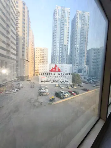 Two-bedroom apartment with a living room for rent in Al Taawun area