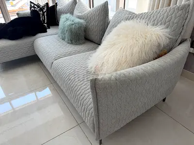 Light grey quilted armchair with cushion - good condition
