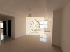 A distinctive apartment in the Al Rashidiya 1 area is available for annual rent. It comprises two ro