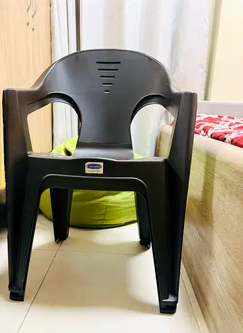 Cosmoplast Plastic Chair with Armrests – Good Condition