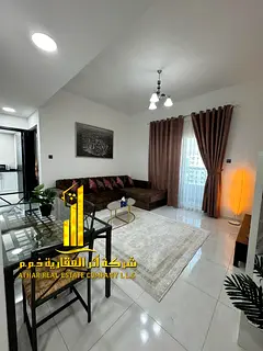 Luxury apartment, second occupancy, one bedroom, living room with open balcony. Ajman, Al Rawda 2. a