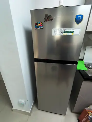 Silver double-door refrigerator - good condition