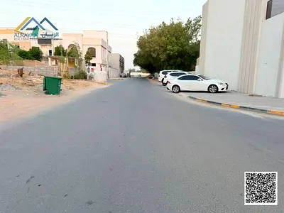 Land for building a luxury villa, freehold, at the lowest price in Al Yasmin