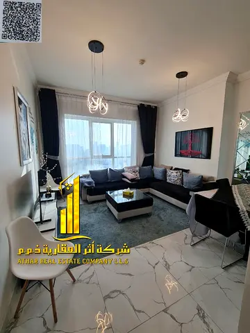 ✨ The most luxurious and elegant one-bedroom apartment for sale in Al Waha Towers, Rashidiya 1, next to Nesto! ✨ Enjoy a luxurious lifestyle with a g