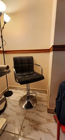Adjustable Black Leather Bar Stool with Backrest and Chrome Base