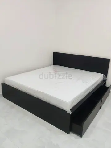 IKEA Malam king size bed 180/200cm with 2 storage drawers underneath and Ikea mattress is available