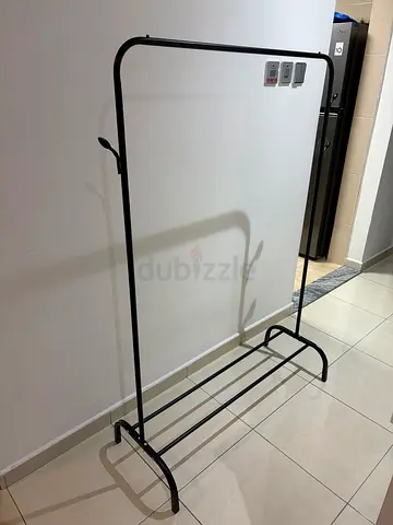 Simple Black Metal Garment Rack with Wheels - Good Condition