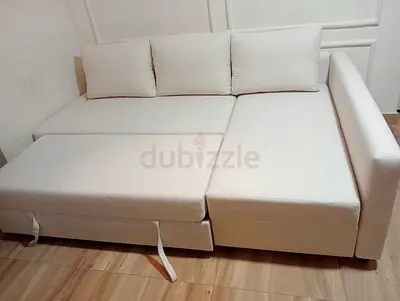 Comfortable Cream Sofa Bed with Pull-Out Extension