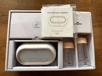 Spectra Dual Compact Electric Breast Pump - Barely used (few times only) in Box. Bought for AED 2550