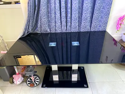 Durable black glass dinning table