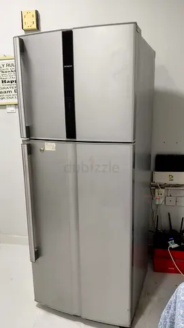 Silver double-door refrigerator - good working condition