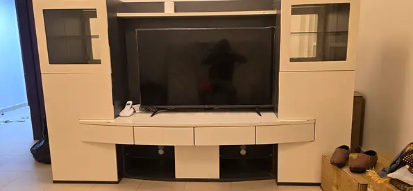 White entertainment TV unit with storage cabinets - good condition