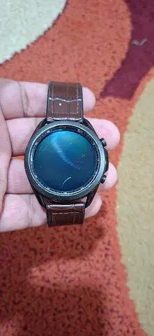 Samsung Watch 3 45mm with leather strap and adaptor used.(shows wear) made in Vietnam.