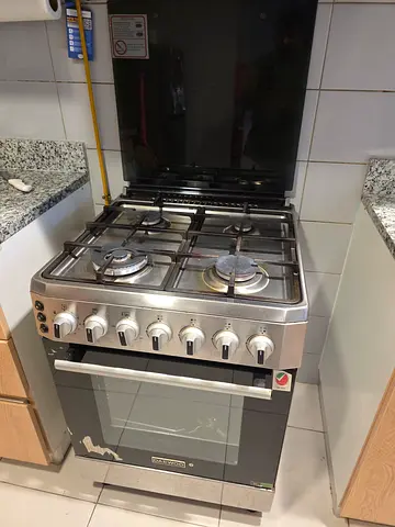 Stainless Steel 4-Burner Gas Cooker with Oven - Good Working Condition