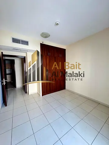 1-Bedroom Apartment for Annual Rent in Al Majaz 3, Sharjah, featuring a Master Bedroom with Built-i