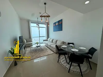 Sea view. Luxury apartment, second occupancy. One bedroom and living room with a balcony offering an open view. Ajman Corniche.