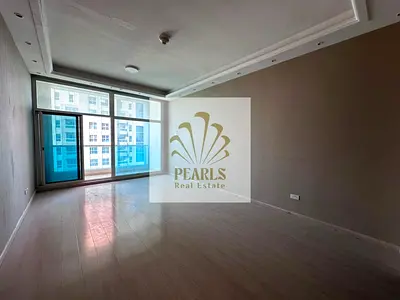 Spacious 1BR with sea view in Ajman One, Rashidiya 3. Master, 2 baths, dressing room, premium finish. AED 39K/year, 4 payments, cheque deposit.