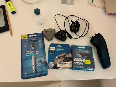 Shaving Set. Philips Electric Shaver with Extra Gillette Blades and Charger - Good Condition.