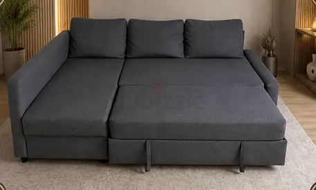 Dark grey L-shaped sofa bed with storage, converts to double bed