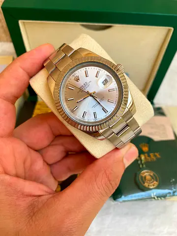This is a Rolex Datejust 41 with a silver index dial and stainless steel Oyster bracelet.