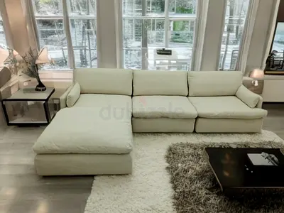 Expensive quality home center feather 🪶 filled modular sofa with ottoman
