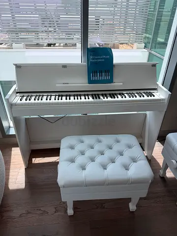White Yamaha digital piano with bench - perfect condition