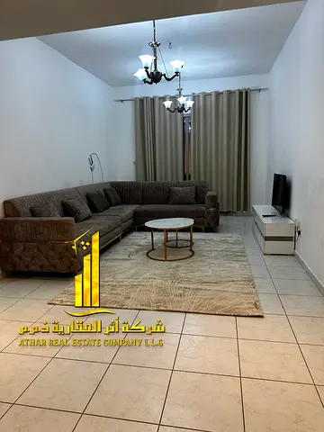 Luxury one-bedroom apartment with a living room and open balcony. Ajman, Al Rashidiya 3. available for monthly rent.