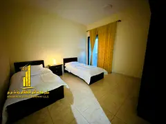 Luxurious two-bedroom apartment with a living room, fully furnished with brand new, high-end furnitu