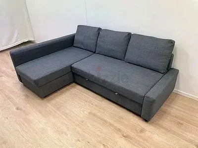 Grey L-shaped Fabric Sofa bed with Chaise — Good Condition