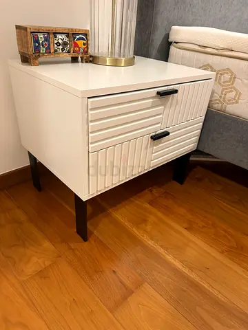 2x White bedside tables set with drawers and modern grooved front