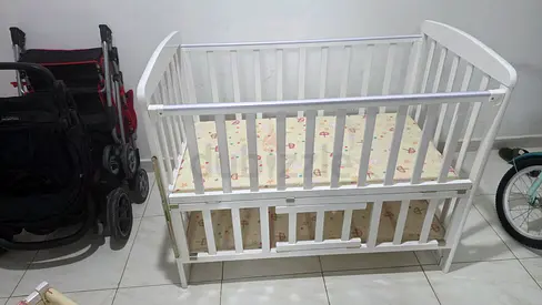 Baby Cot with with Swing 3 in one along with covered NET.. Wooden in good condition same like new