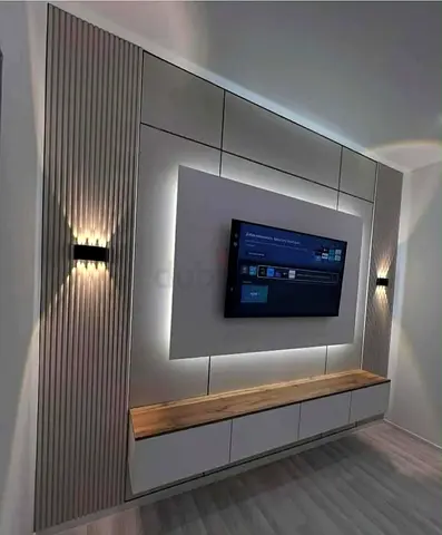 Modern built-in TV entertainment wall unit with LED backlight and storage