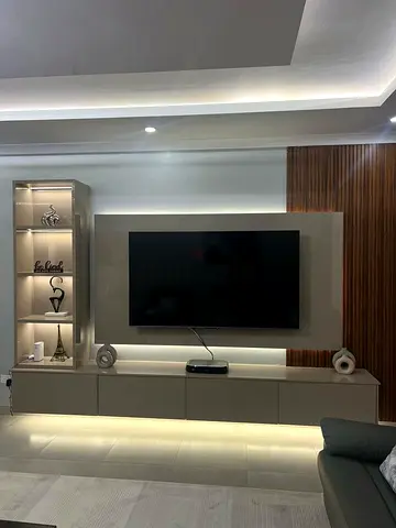 Modern glossy wall-mounted TV entertainment unit with display cabinet