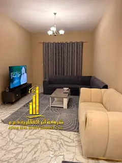 Luxury apartment, second occupancy, two bedrooms, living room, and open balcony. Ajman, Al Rashidiya