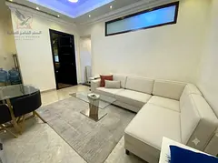 Furnished two-bedroom apartment with a living room for monthly rent in Al Rawda 3, Ajman, near Bahar