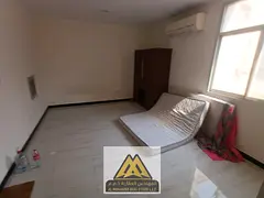 Large studio in Al Zahya, ground floor, split AC, new family building, near services and Dubai & Sha