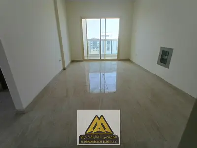 2BR in Al Jurf 3, balcony, 2 baths, central AC, premium finishes, free maintenance, family building, AED 42,002/year.