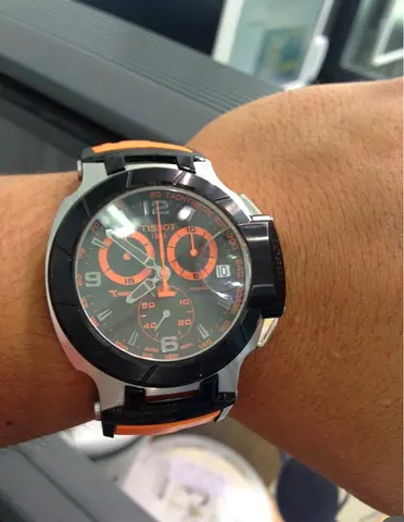 Tissot men's chronograph watch with orange accents – good working condition