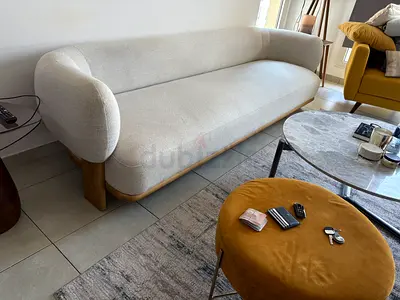 Modern curved 3-seater sofa. Off white/light grey - very good condition, ~ 1.5 year old.